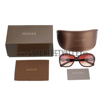 Gucci Elegant Oval Shaped Brown Sunglasses 308033