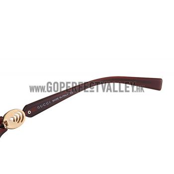 Gucci Elegant Oval Shaped Brown Sunglasses 308033