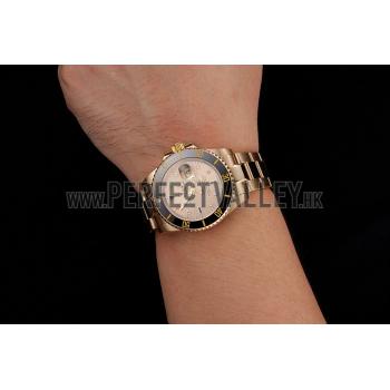 Swiss Rolex Submariner Gold Dial With Diamond Markings Black Bezel Yellow Gold Case And Bracelet